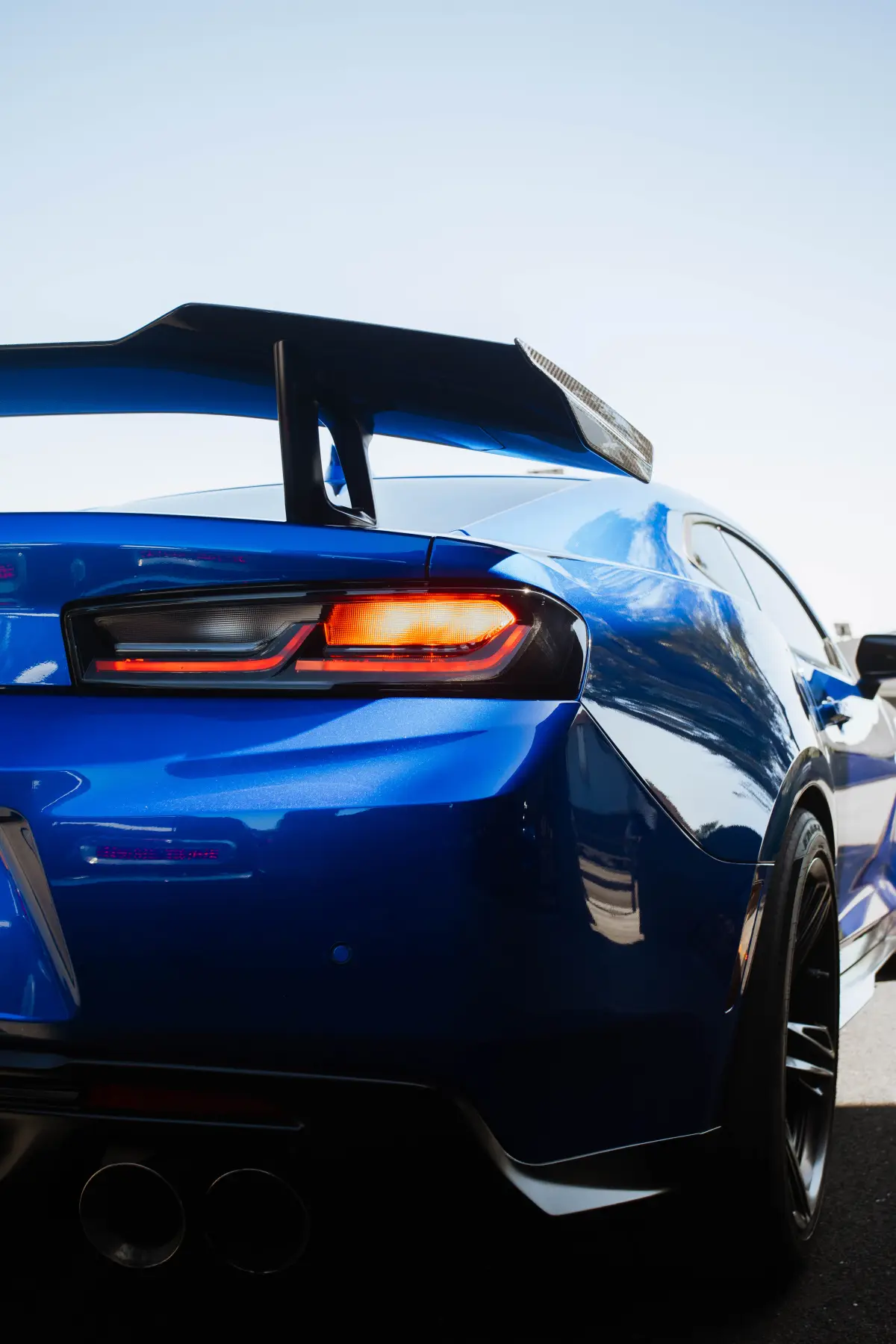 Electric-blue Camaro rear quarter and taillight at Kreations Auto Body