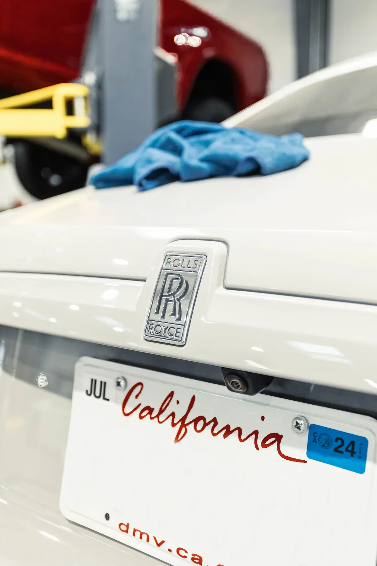 Rolls-Royce badge and grille on a car being detailed at Kreations Auto Body
